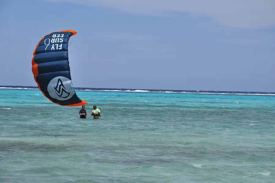 Kite flying low over the calm KiteMood lagoon in Marsa Alam